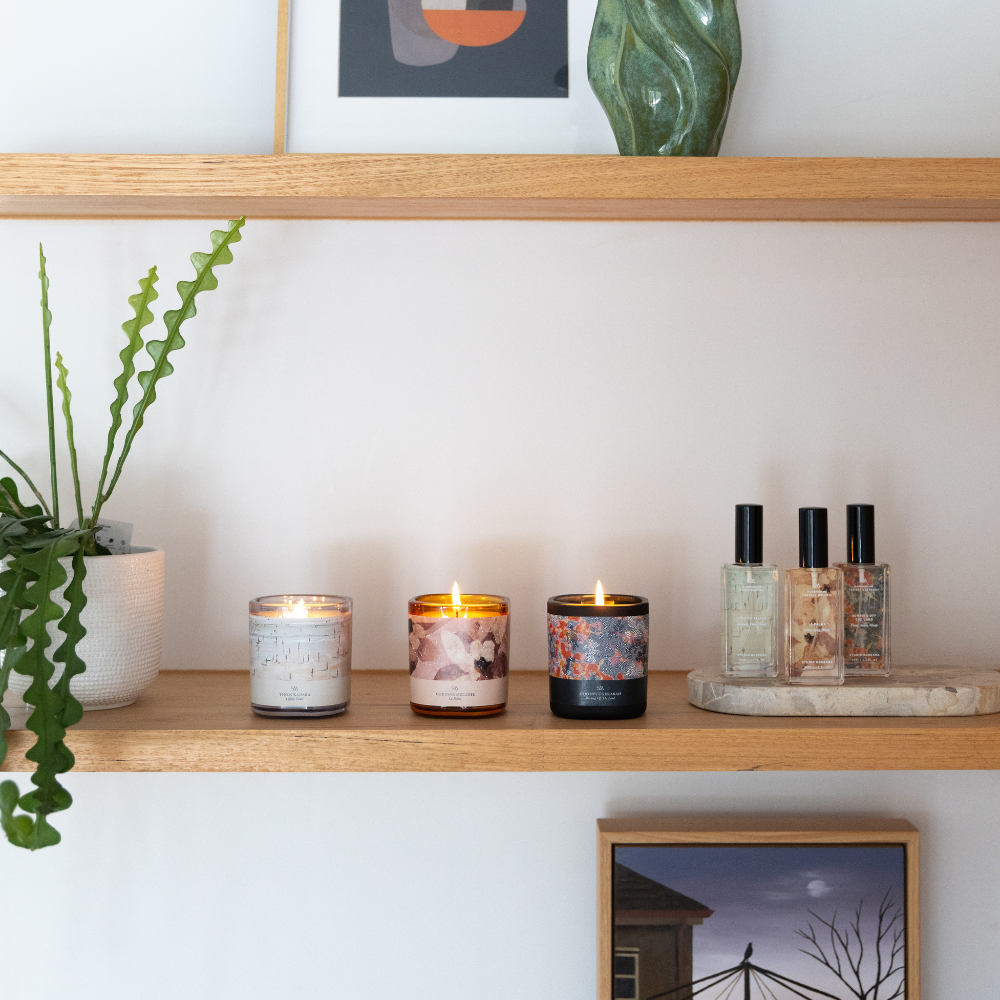 Burning Off The Land Candle lit, evoking smoke and woody fragrance notes