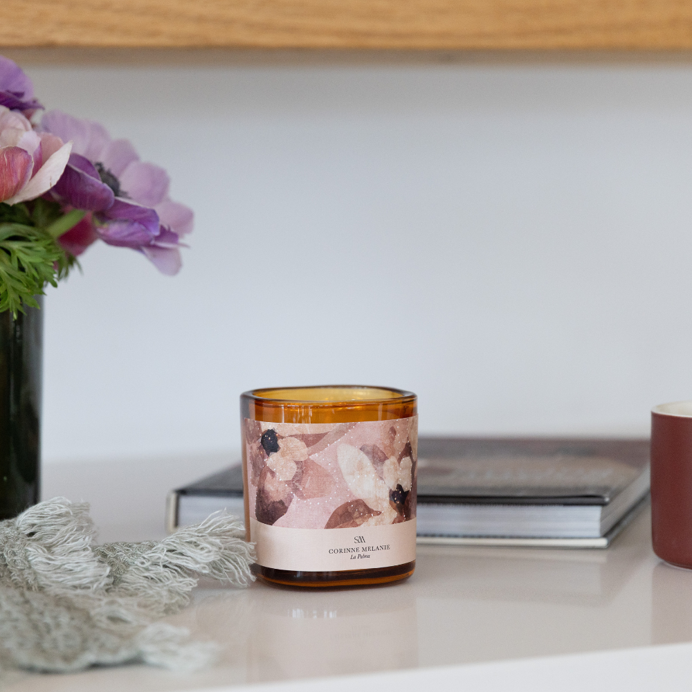 Close-up of La Palma Candle showing Corinne Melanie’s celestial artwork and label details