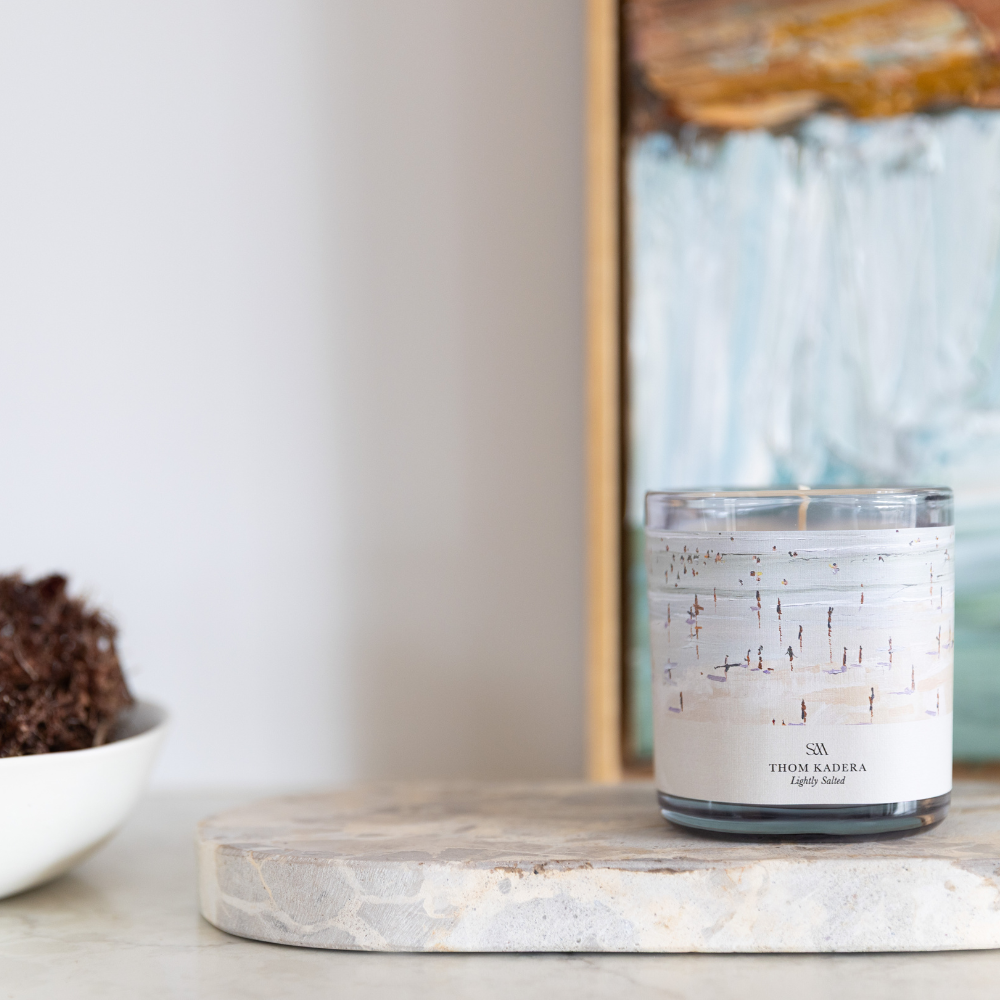 Lightly Salted Artist Series Candle styled in a coastal interior setting