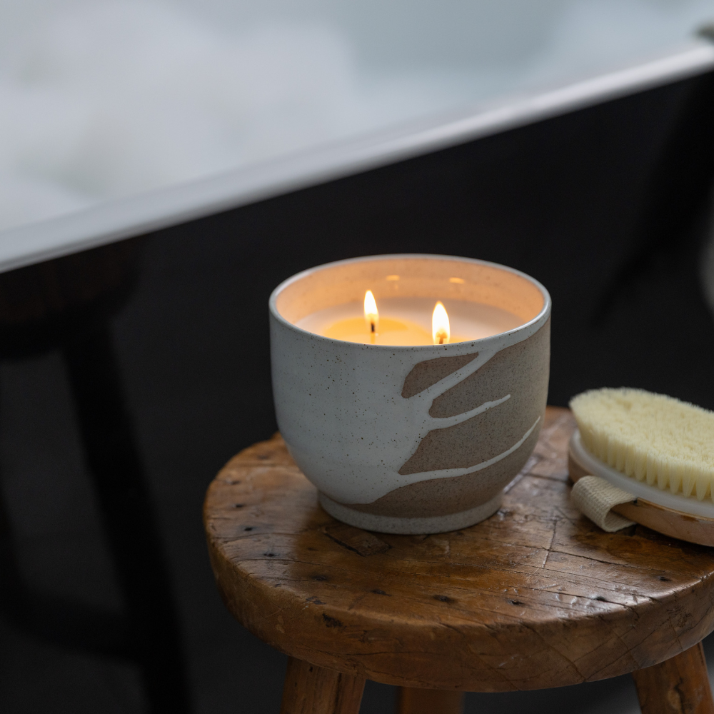 Lunara Candle by Studio McKenna — styled in bathroom for an elevated interior setting