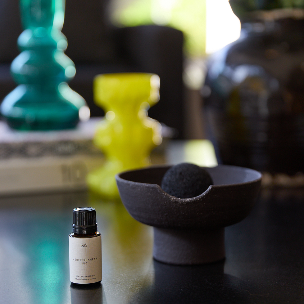 Studio McKenna Mediterranean Fig fragrance oil in amber dropper bottle for use with Obsidian diffuser