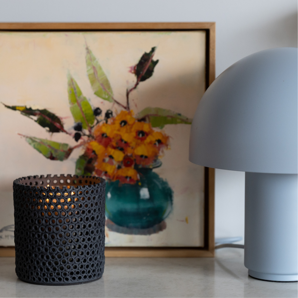 Close-up of The Foundry Coralite Ebony Candle showing handcrafted ceramic coral-inspired detail