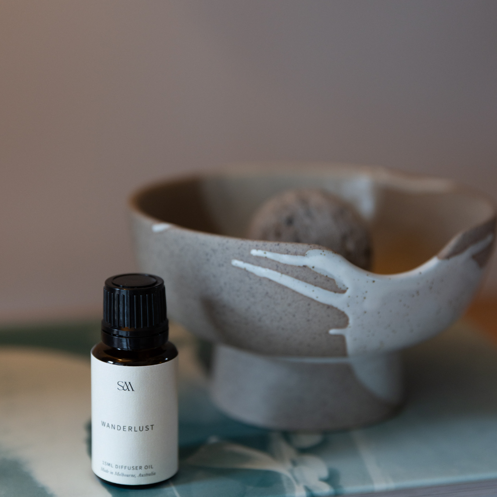 Lunara Diffuser with ceramic base, porous rock and wanderlust fragrance oil blend