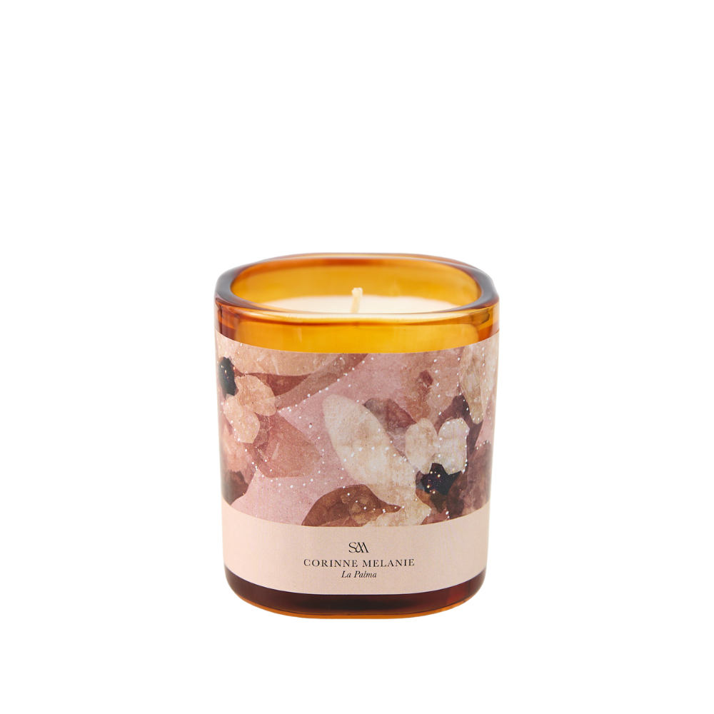 Close-up of La Palma Candle showing Corinne Melanie’s celestial artwork and label details