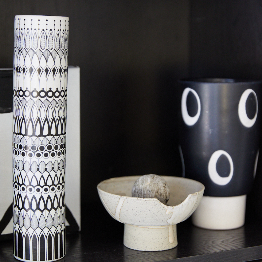 Studio McKenna Lunara Diffuser styled on shelf with monochrome ceramics — sculptural home fragrance piece