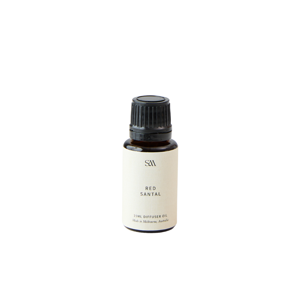 Studio McKenna Red Santal Obsidian Fragrance Oil in amber glass bottle with minimalist label