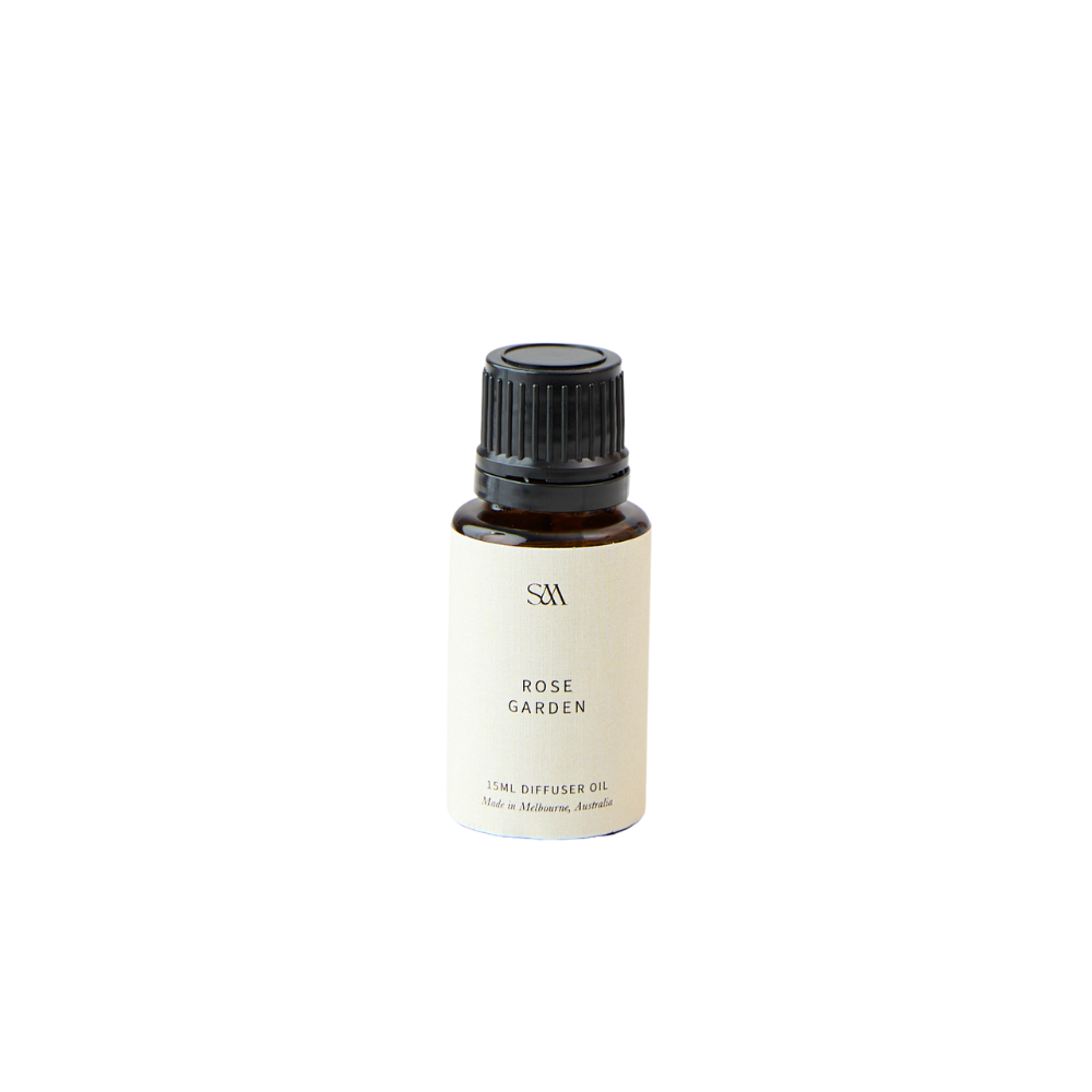 Studio McKenna Rose Garden Fragrance Oil in amber glass bottle with minimalist label