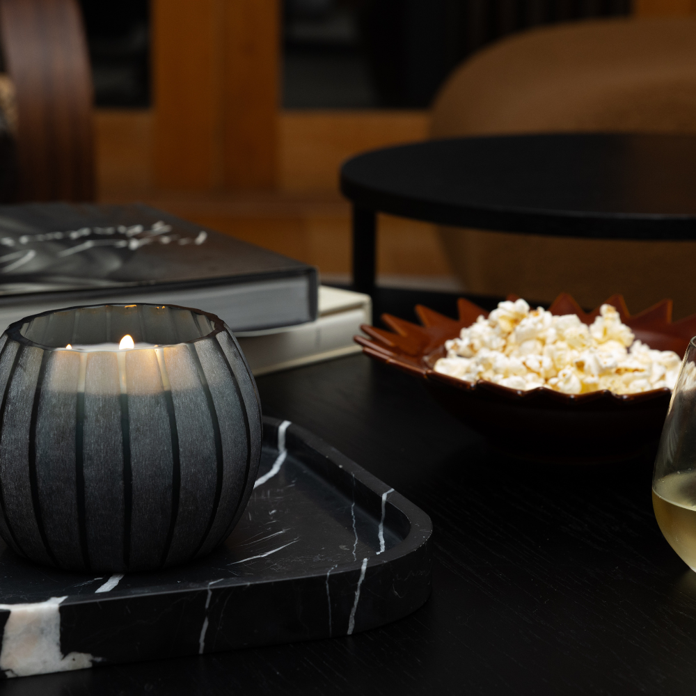Close-up of The Foundry Atolla Blue Bottle Candle showing corrugated glass texture and deep blue finish